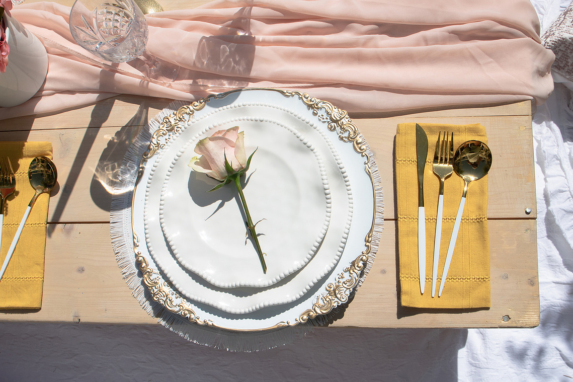 Plate setting for wedding reception. 