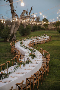 Serpentine table in Tenuta Tresca outdoor reception Puglia