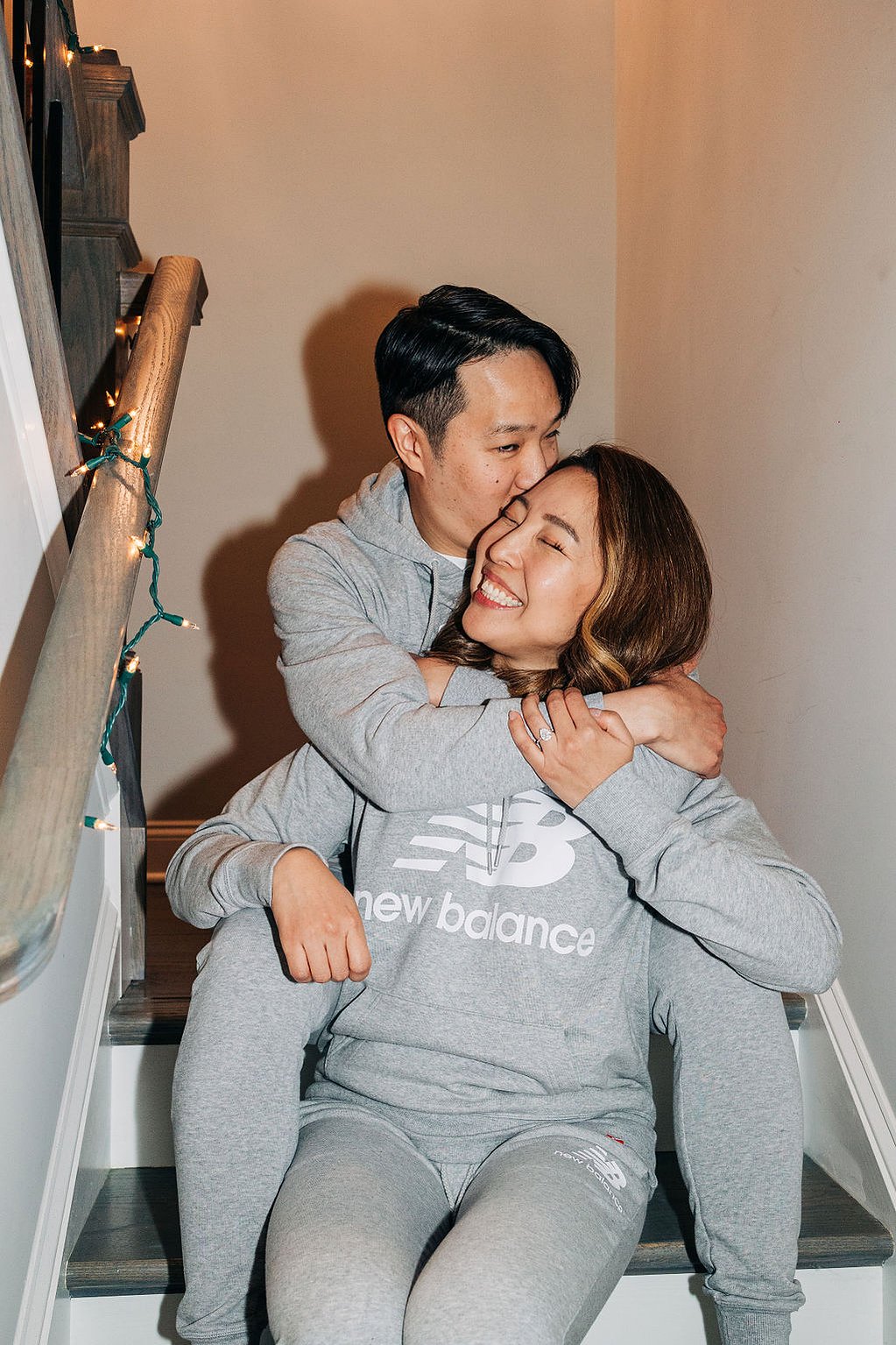documentary style engagement photoshoot at home in the philadelphia suburbs featuring couple with matching new balance sneakers
