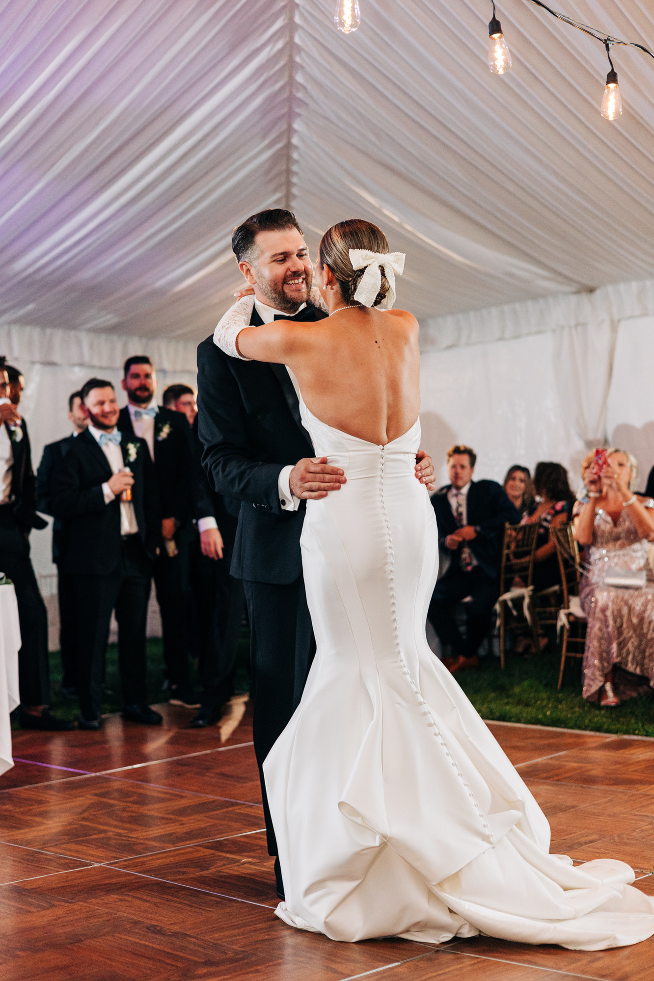 bride and groom first dance tented wedding reception at glenhardie country club near philadelphia pennsylvania main line chester county