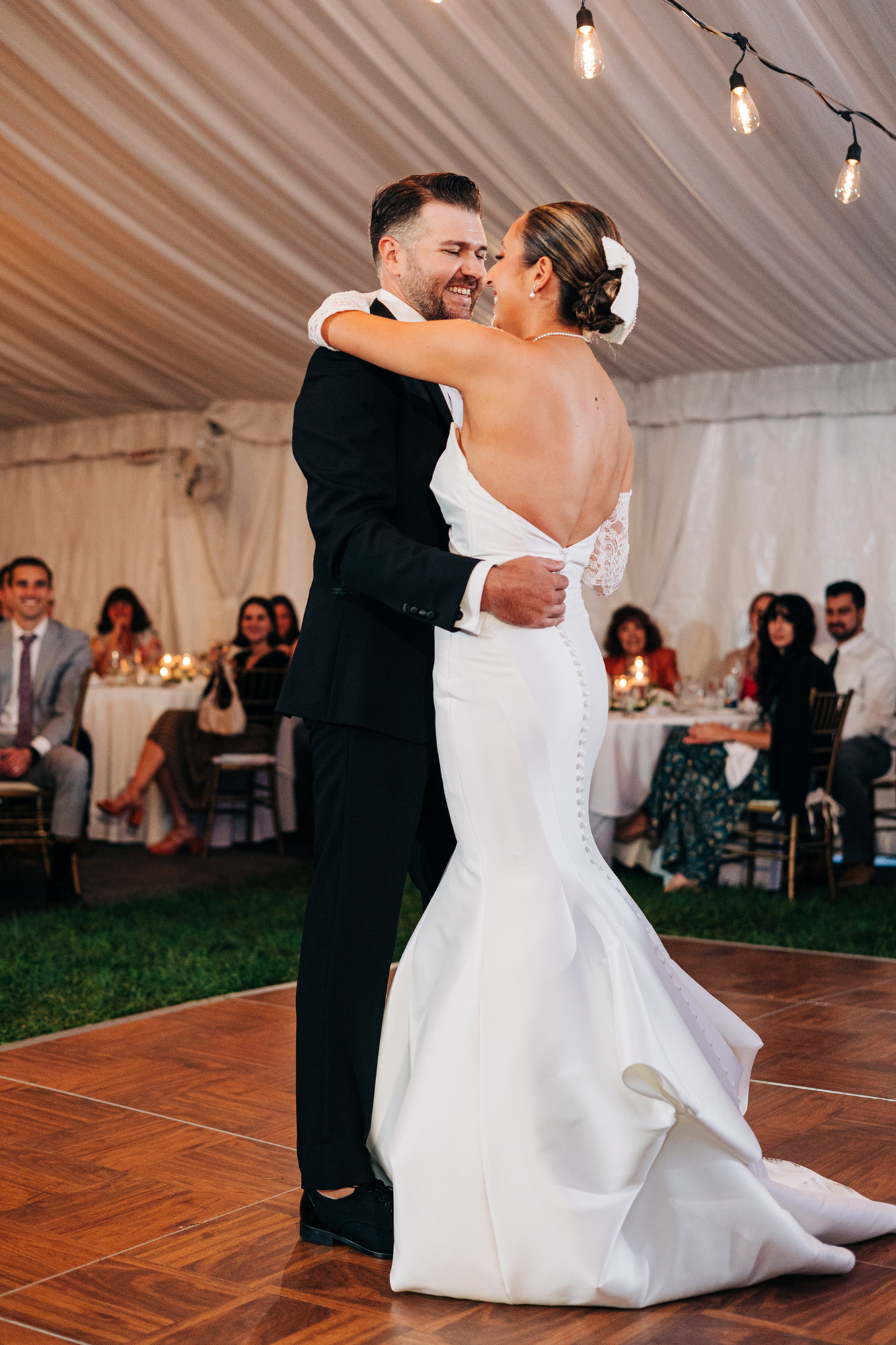 bride and groom first dance tented wedding reception at glenhardie country club near philadelphia pennsylvania main line chester county