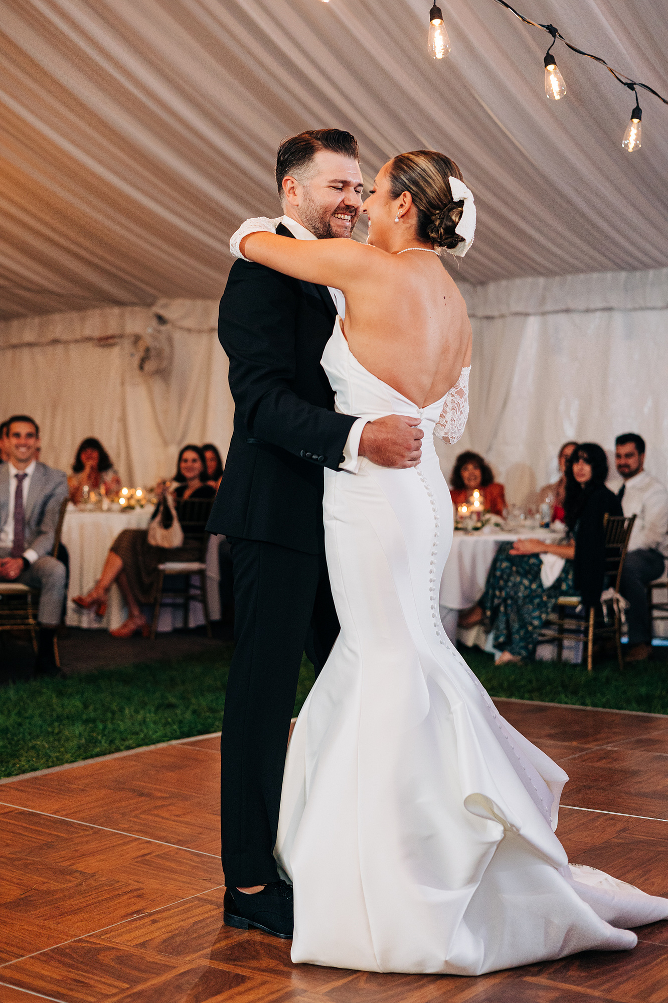bride and groom first dance tented wedding reception at glenhardie country club near philadelphia pennsylvania main line chester county