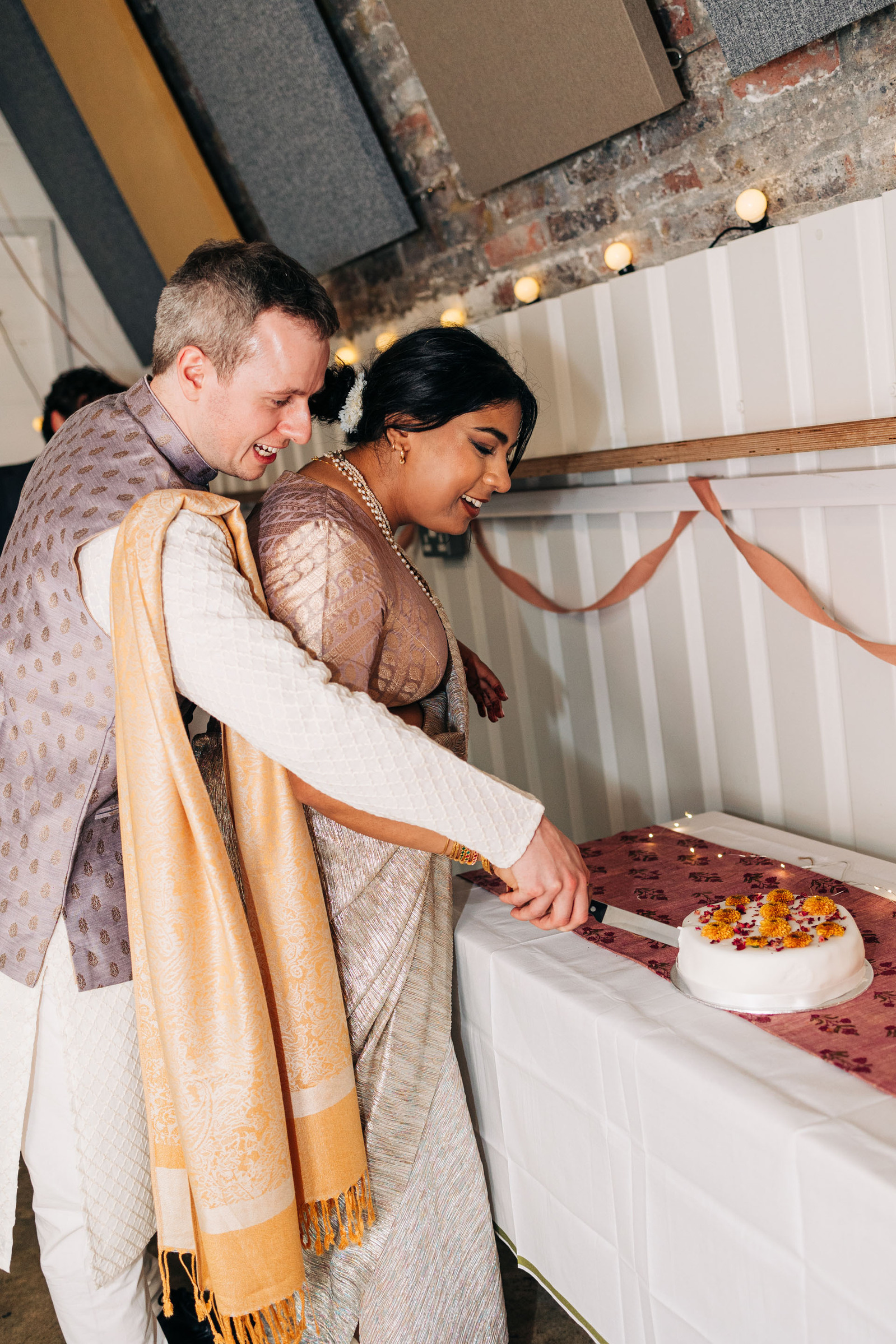Wedding reception party at AMP Studios London colorful multicultural wedding