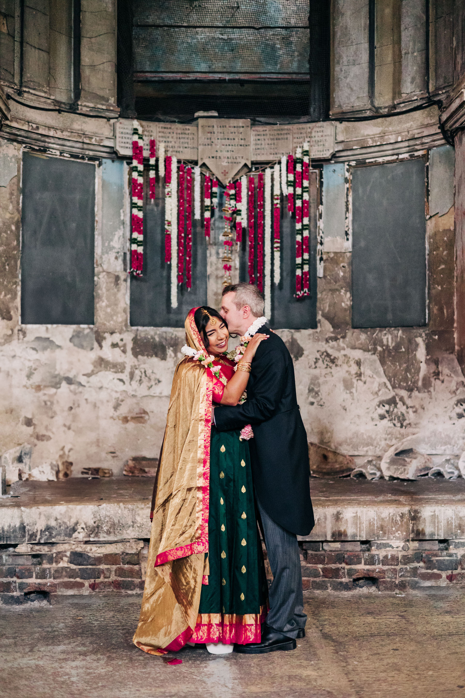 colorful multicultural british indian wedding ceremony at asylum chapel in london england UK wedding