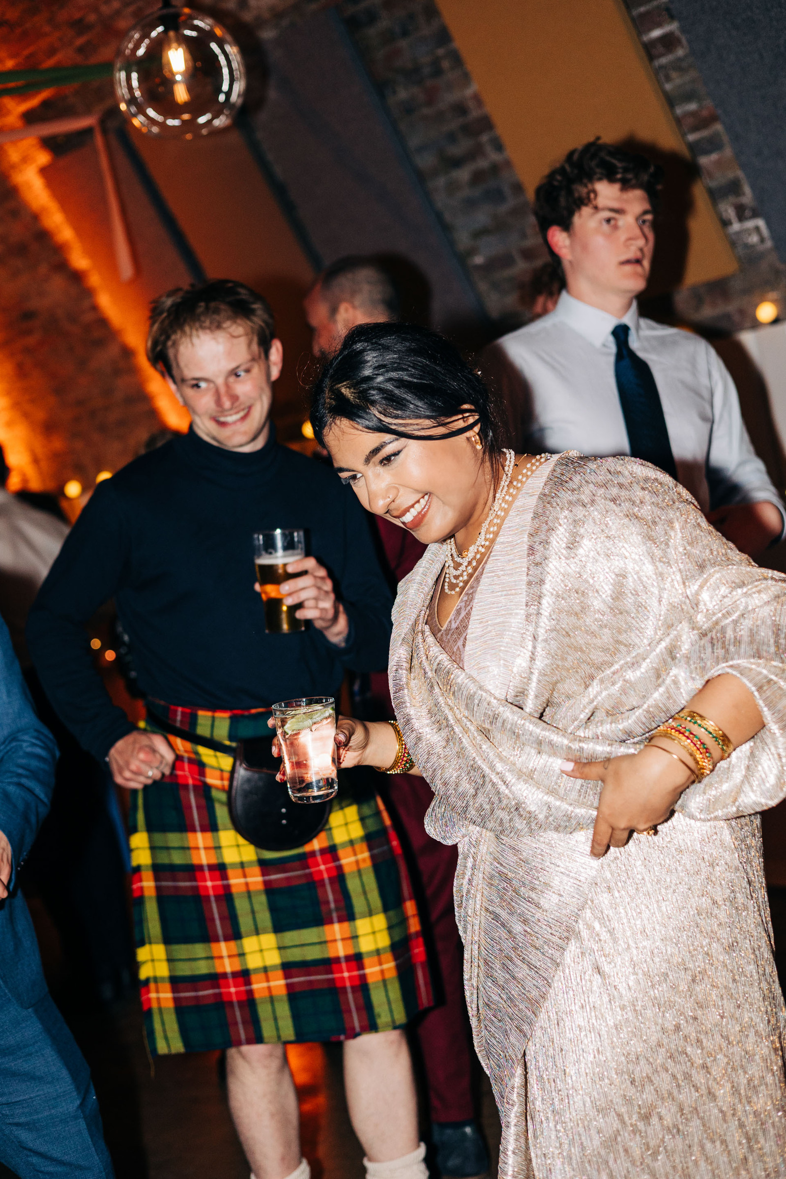 Wedding reception party at AMP Studios London colorful multicultural wedding