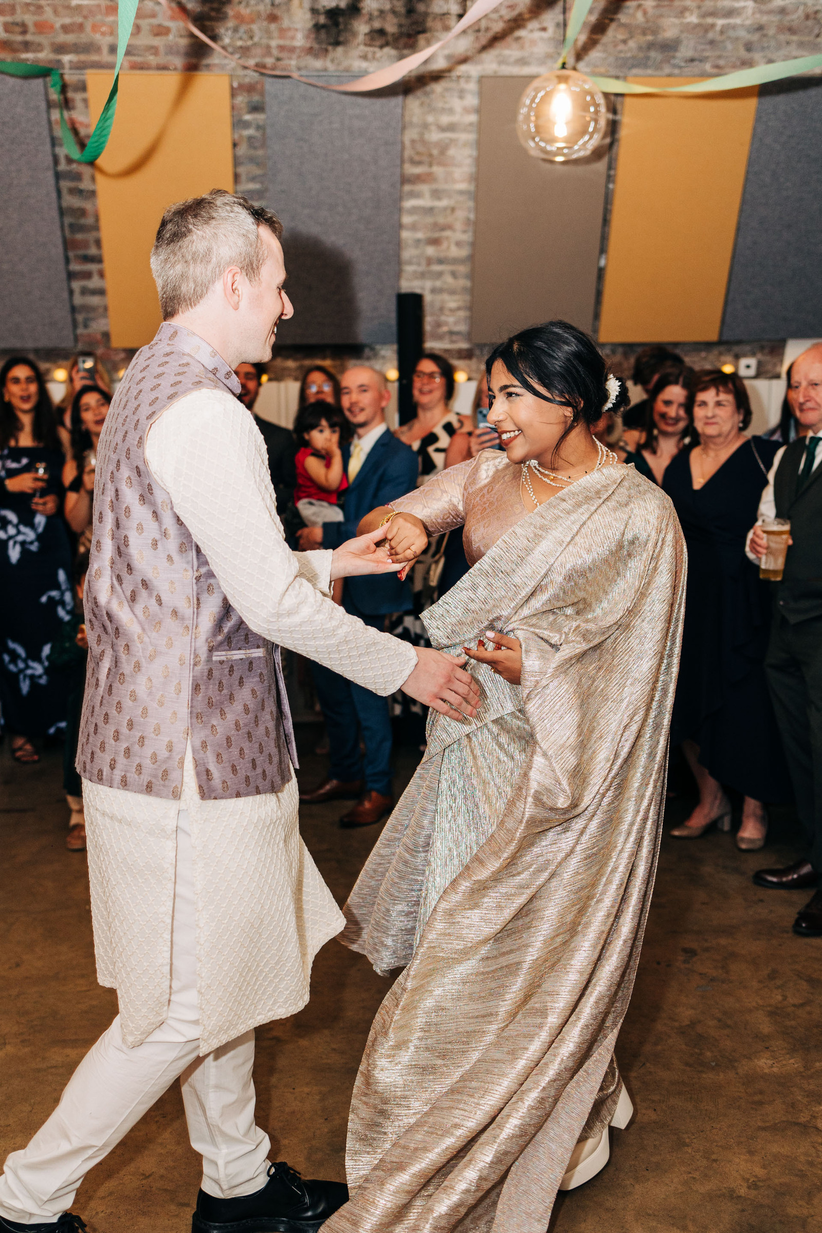 Wedding reception party at AMP Studios London colorful multicultural wedding