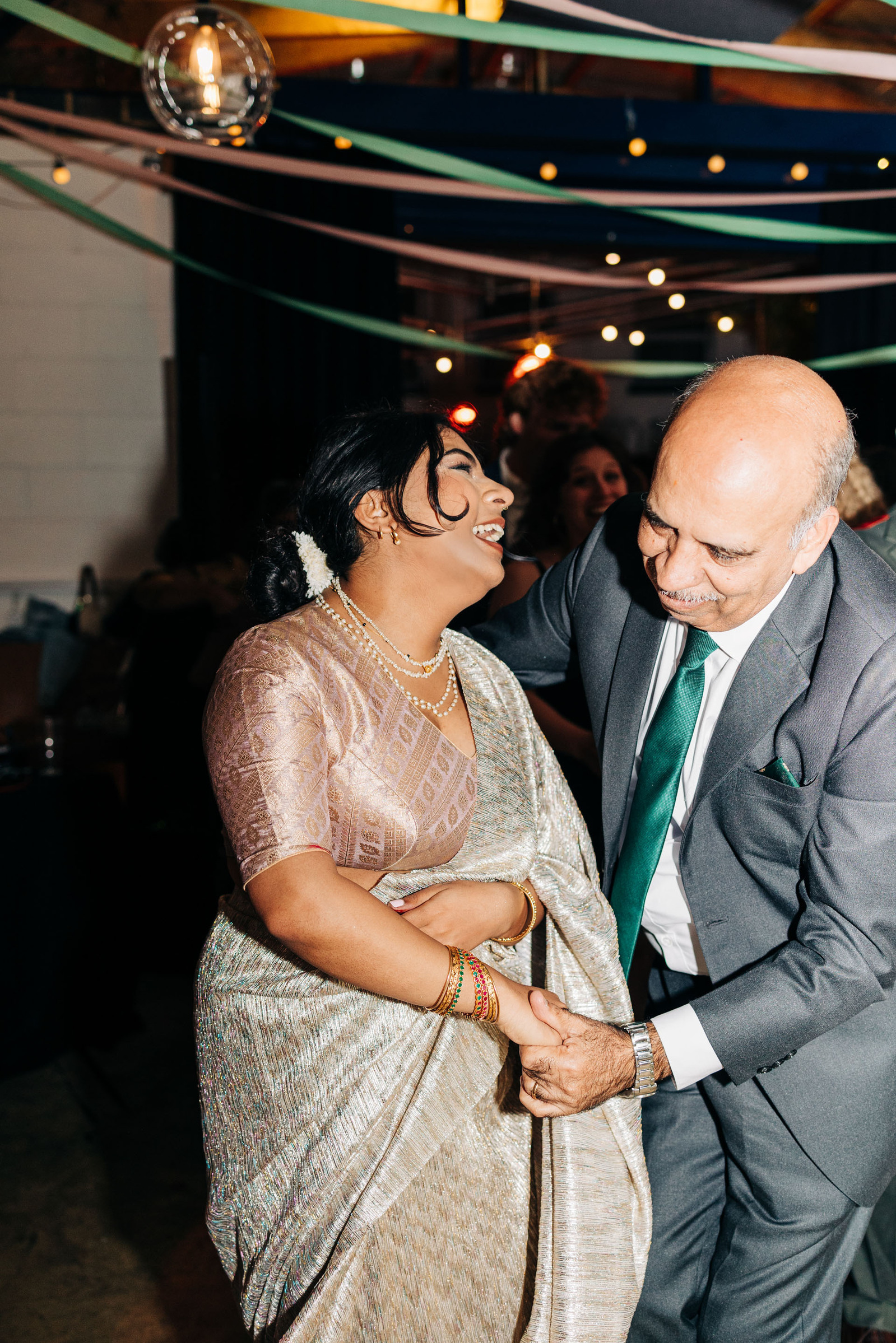 Wedding reception party at AMP Studios London colorful multicultural wedding