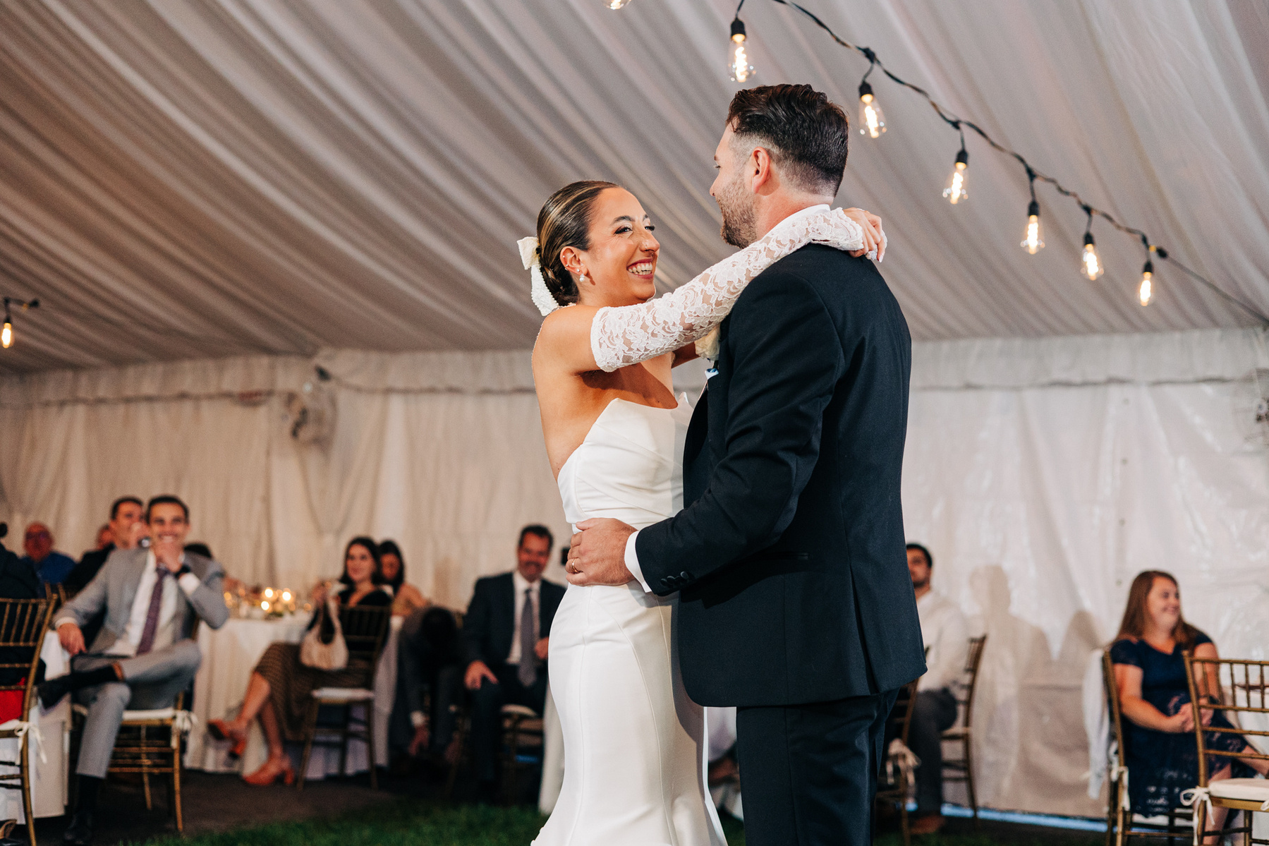 bride and groom first dance tented wedding reception at glenhardie country club near philadelphia pennsylvania main line chester county