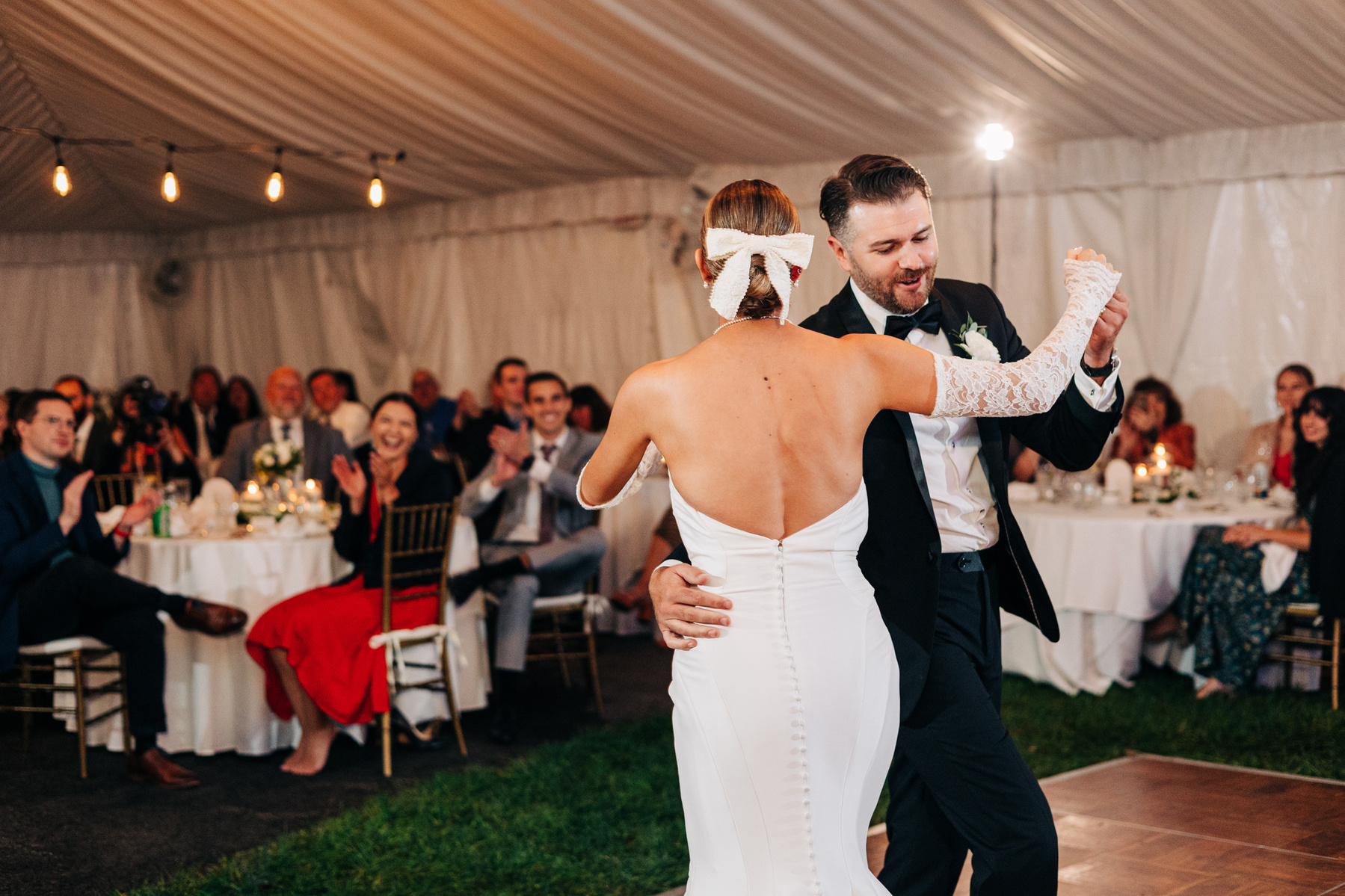 bride and groom first dance tented wedding reception at glenhardie country club near philadelphia pennsylvania main line chester county