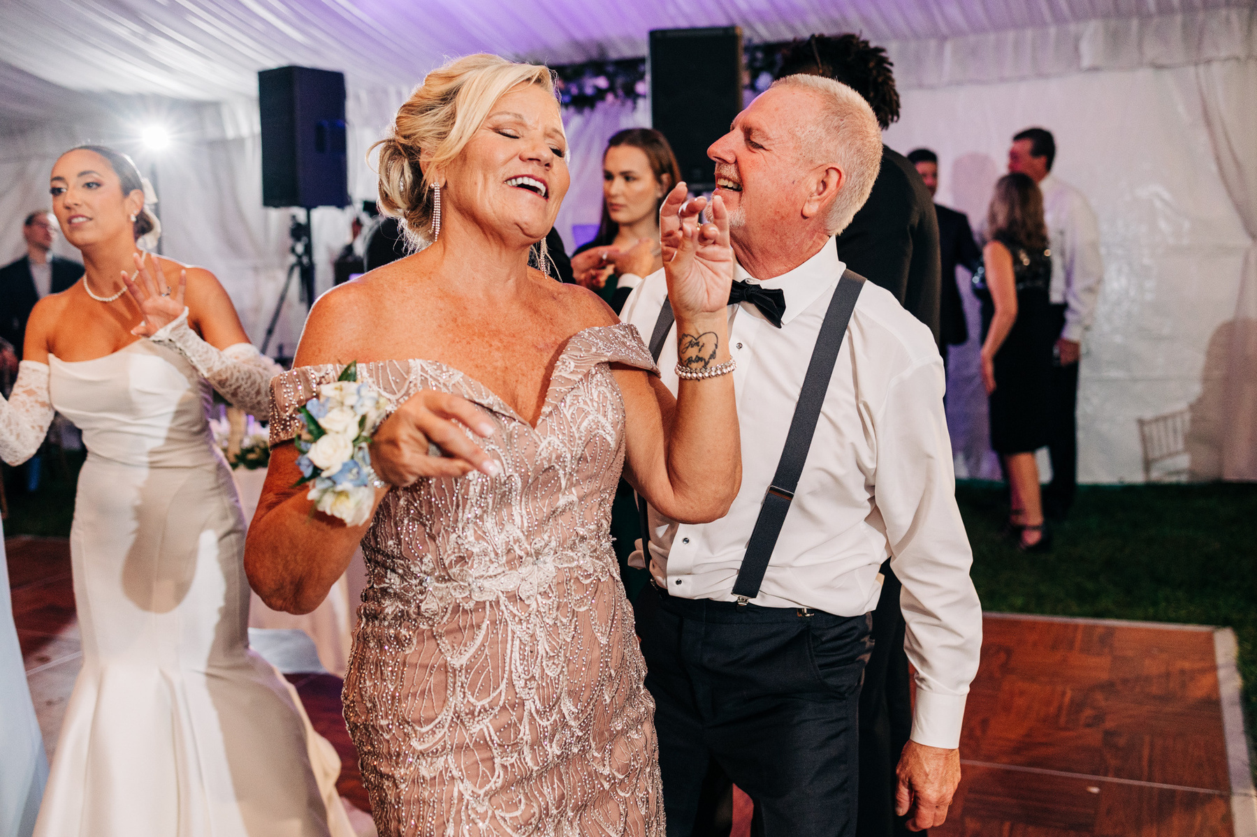 dance party at tented wedding reception at glenhardie country club near philadelphia pennsylvania main line chester county