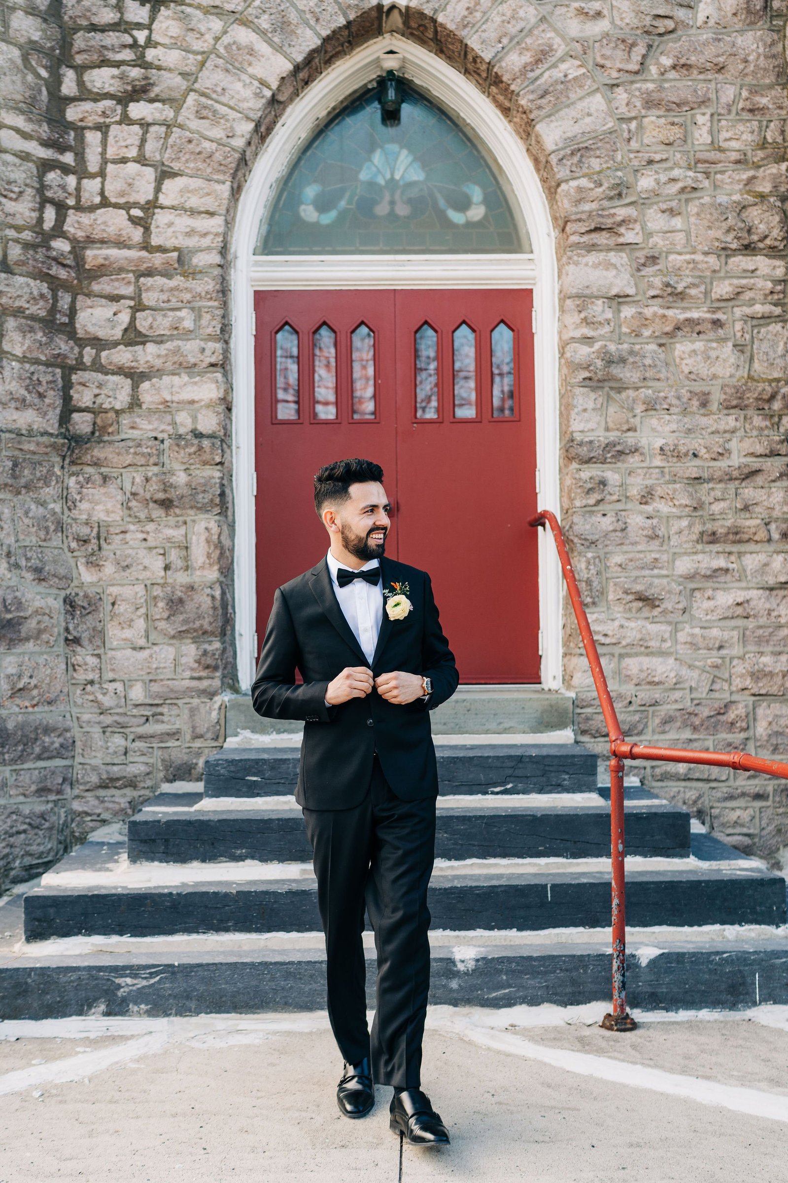 Groom getting ready on his wedding day in Bucks County Pennsylvania