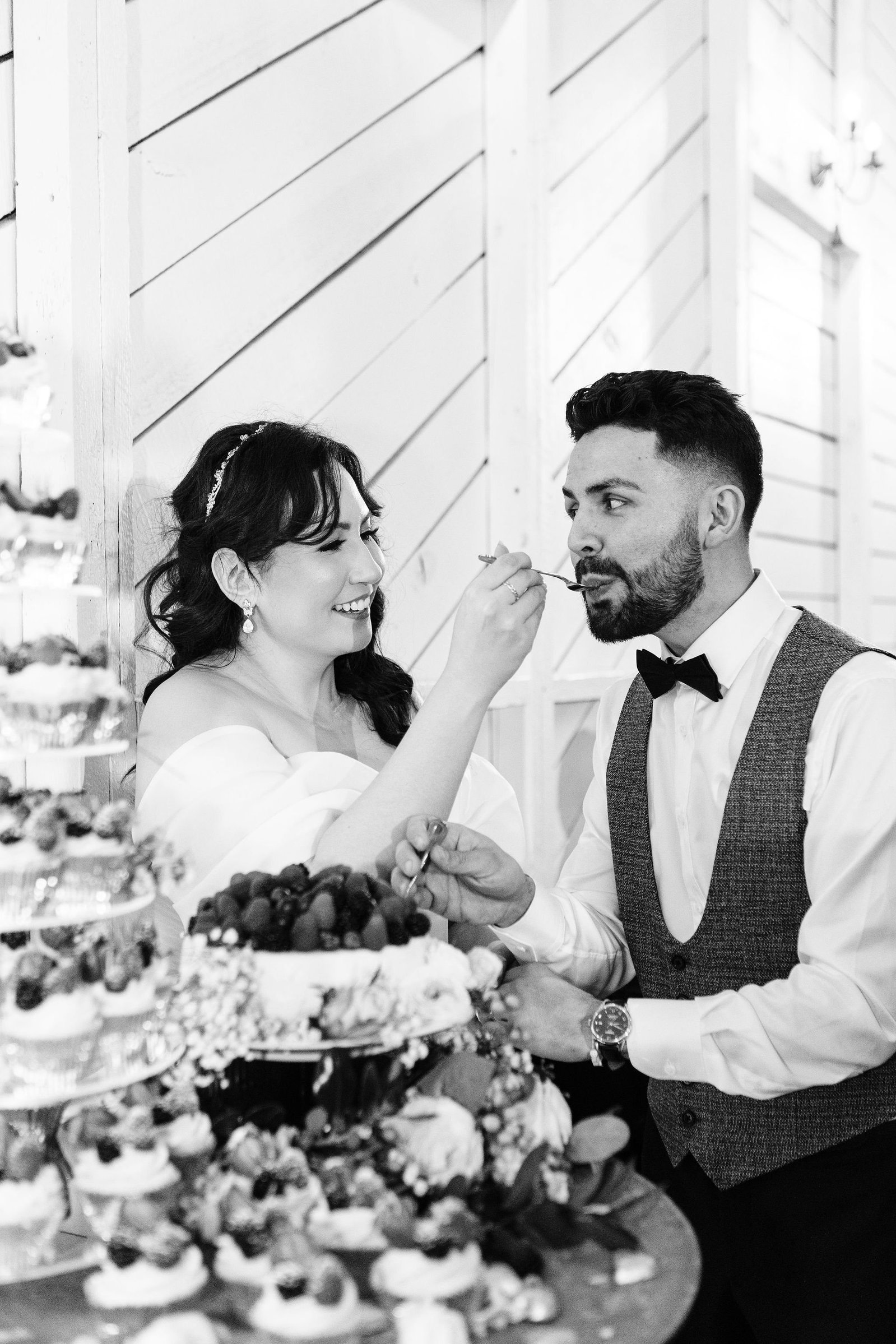wedding reception at terrain delval venue near philadelphia by documentary style wedding photographer cake cutting