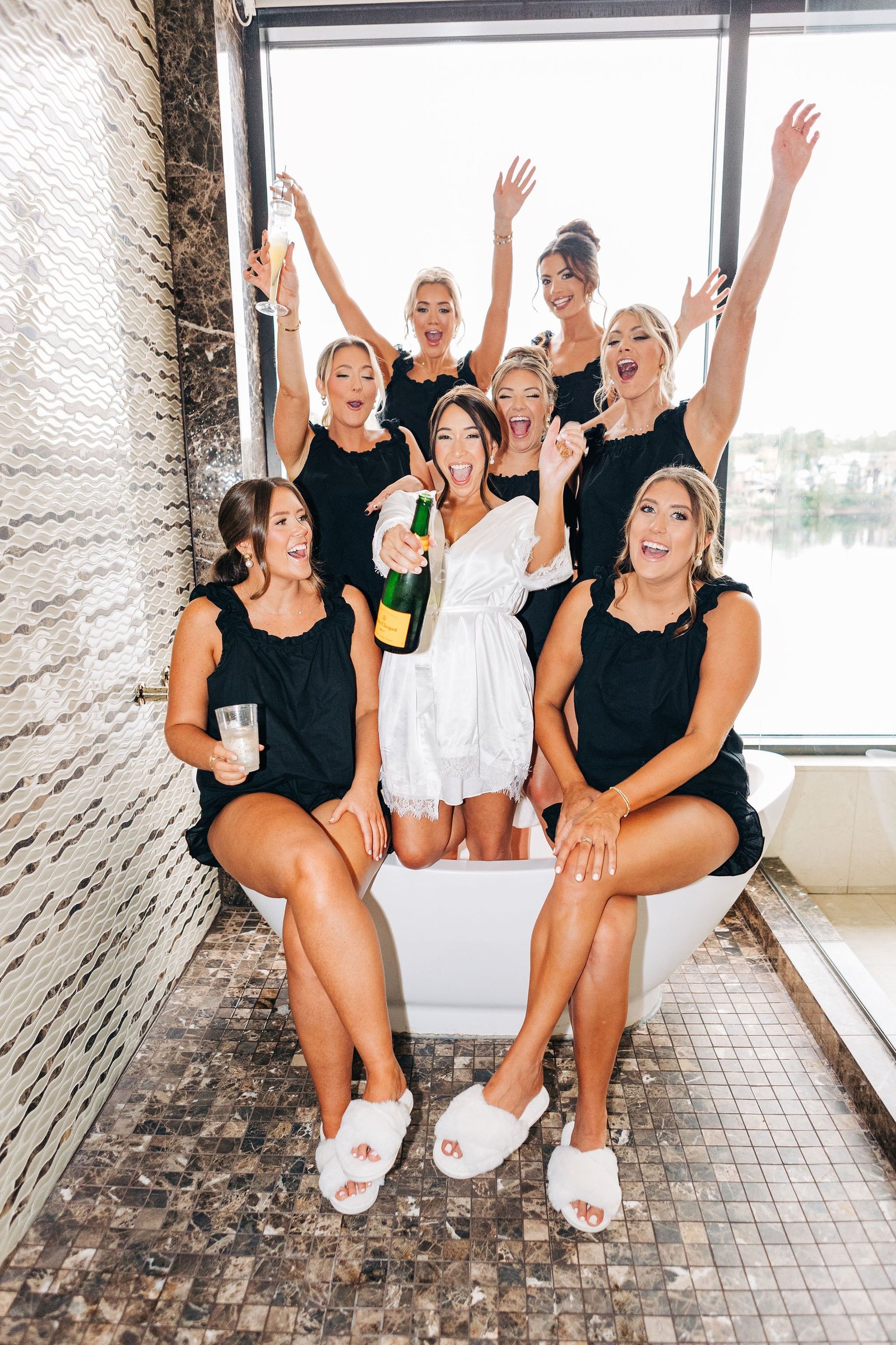 bridesmaids champagne bottle pop lambertville inn new jersey wedding photography