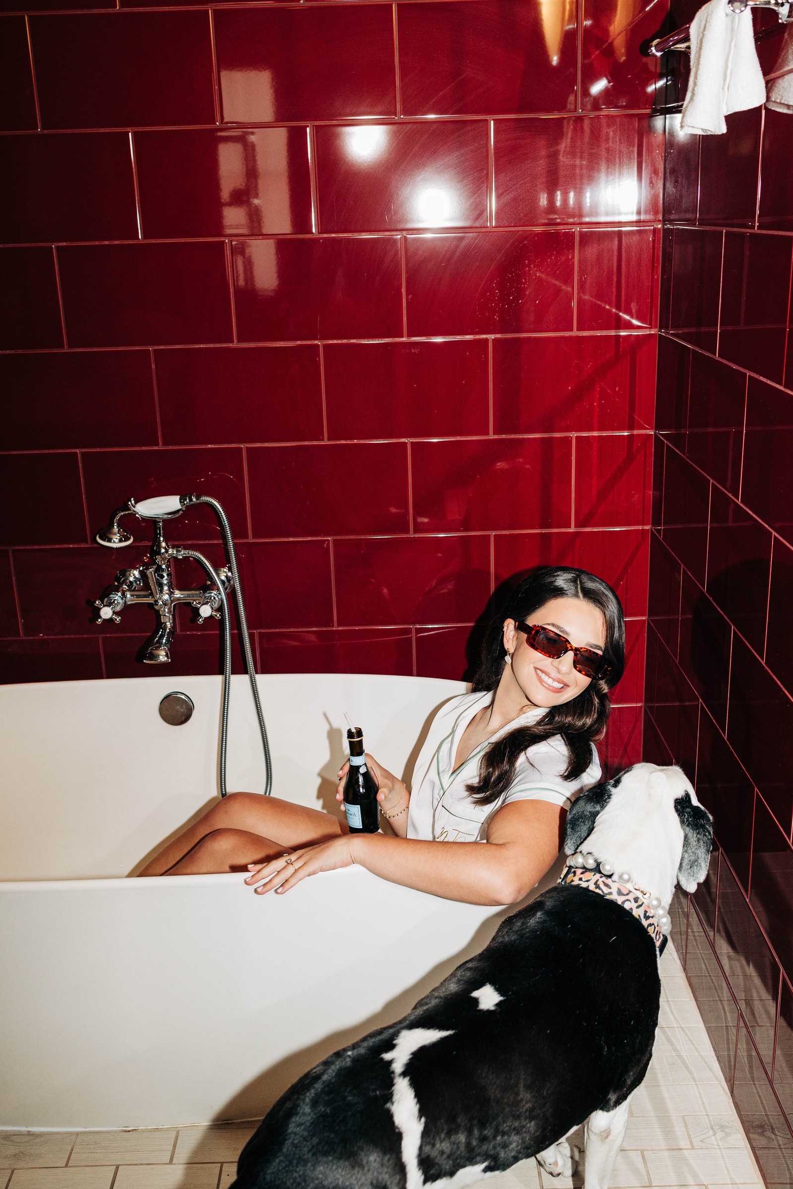 direct flash photography of bride getting ready in bathtub at hotel monaco philadelphia
