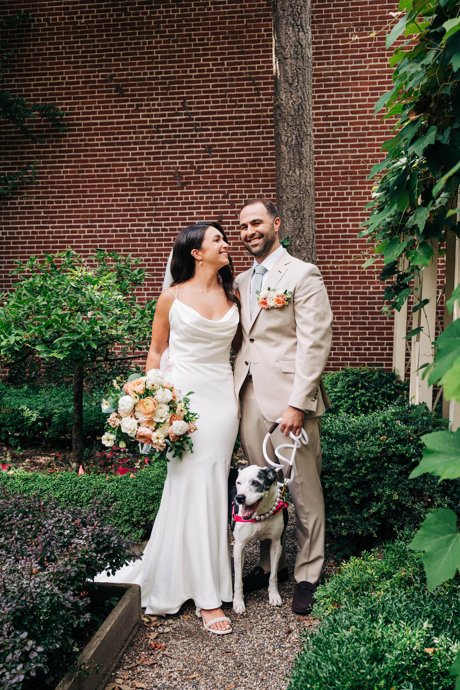 portrait of bride and groom on their wedding day at the 18th century garden in old city philadelphia wedding photographer