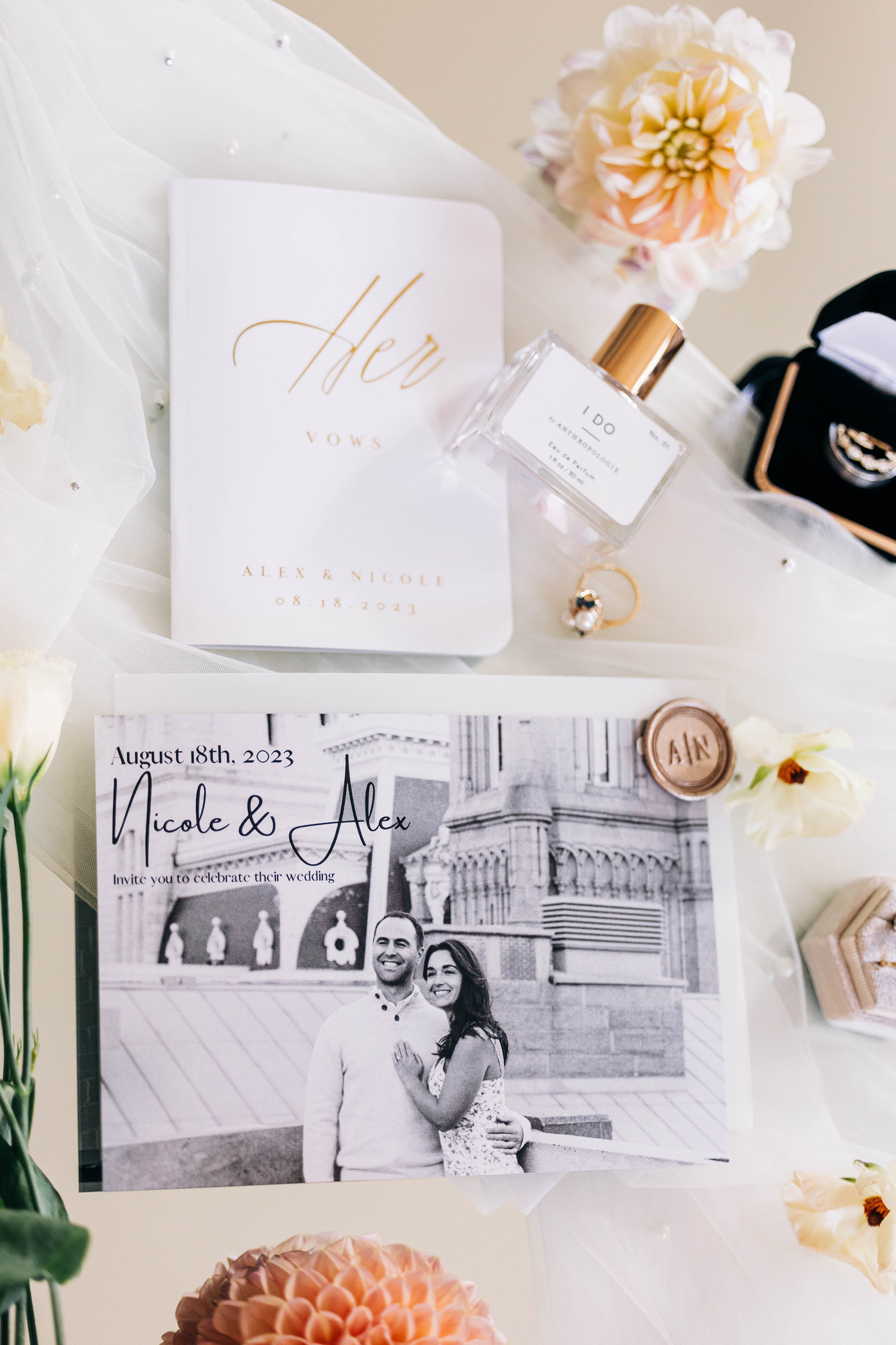 Wedding flatlay featuring classic white details and florals for a Philadelphia wedding