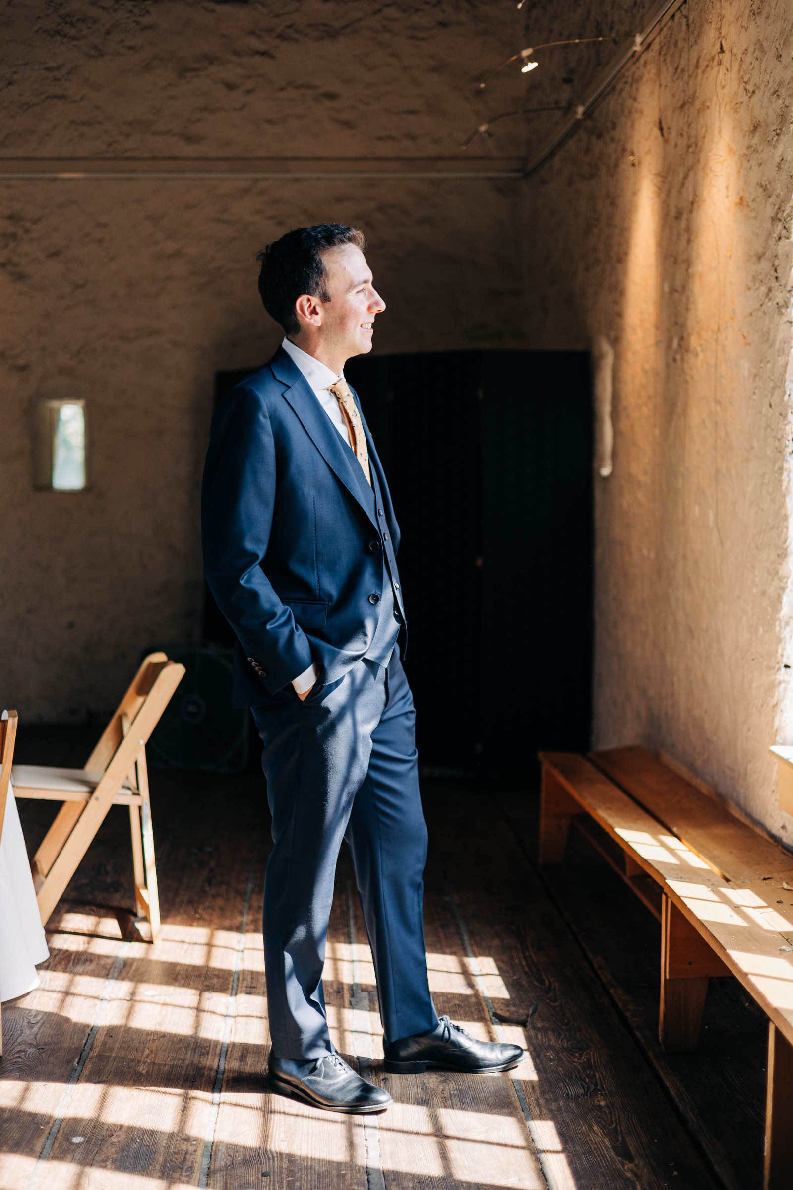 portrait of groom getting ready at bartram's garden in philadelphia