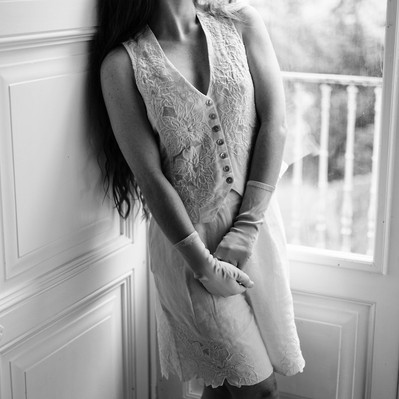 black and white editorial fashion portrait of bride getting ready on her wedding day during a photoshoot in Italy