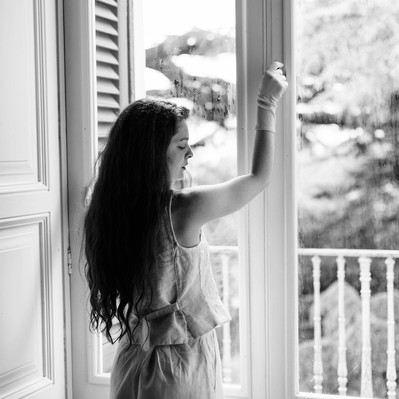 black and white editorial fashion portrait of bride getting ready on her wedding day during a photoshoot in Italy