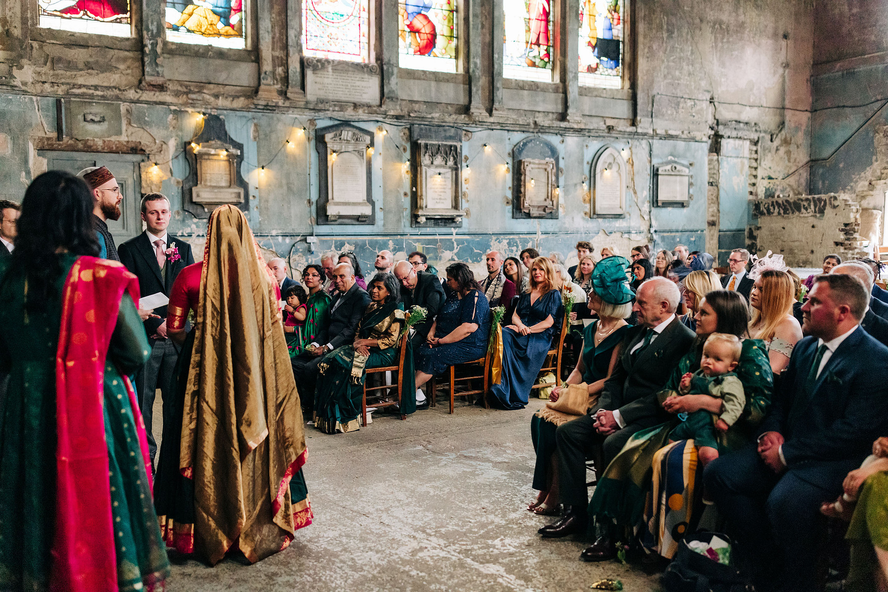 colorful multicultural british indian wedding ceremony at asylum chapel in london england UK wedding