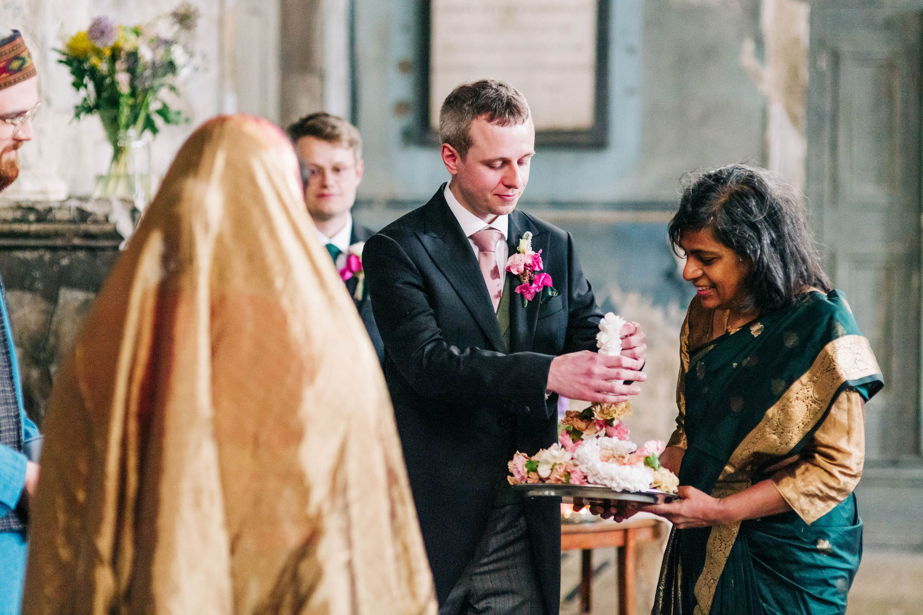 colorful multicultural british indian wedding ceremony at asylum chapel in london england UK wedding