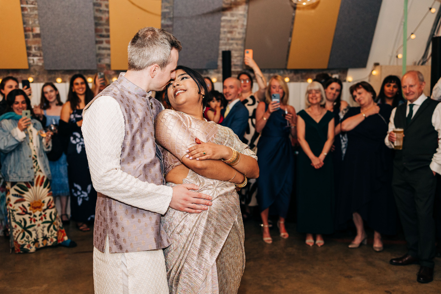 Wedding reception party at AMP Studios London colorful multicultural wedding