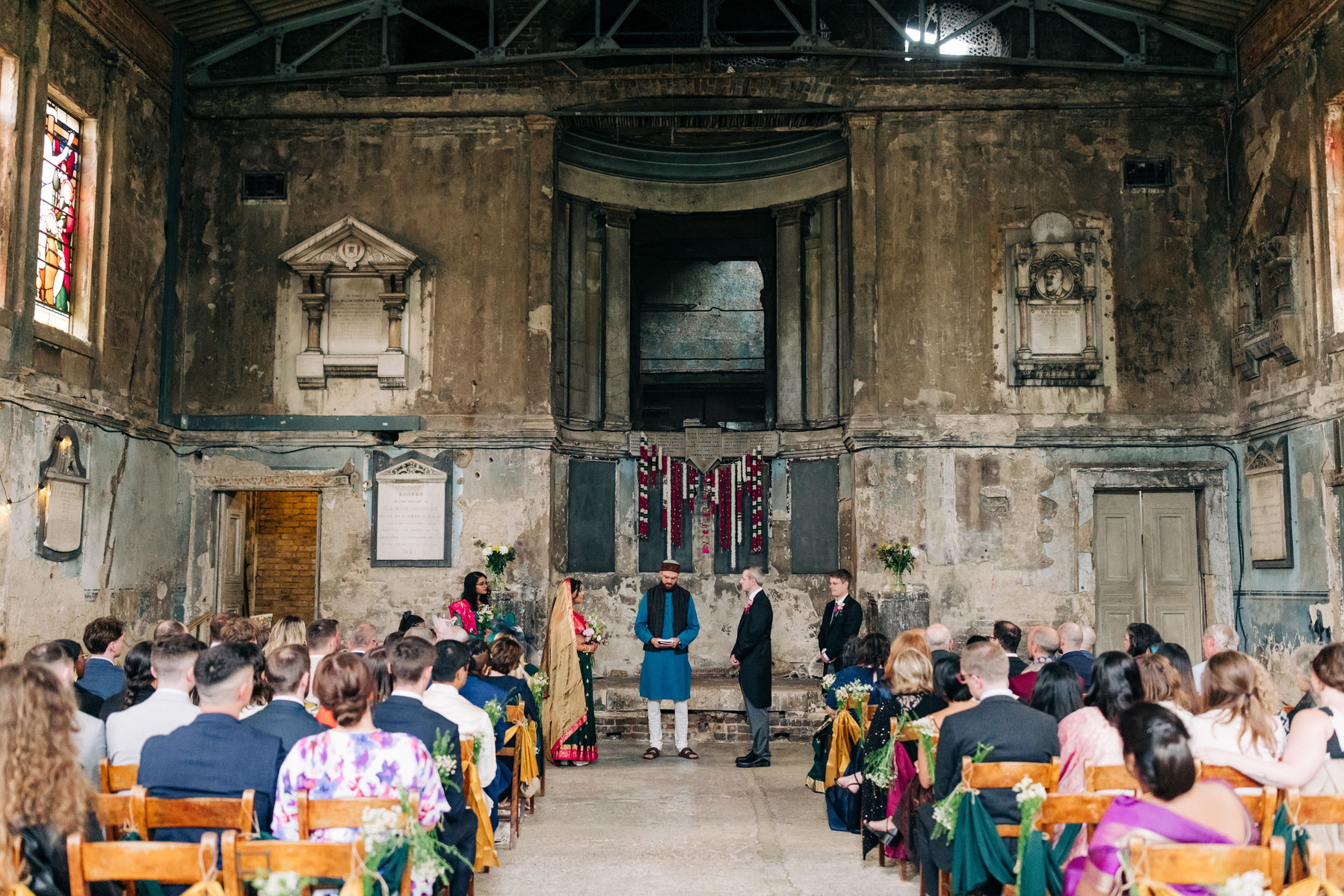 colorful multicultural british indian wedding ceremony at asylum chapel in london england UK wedding