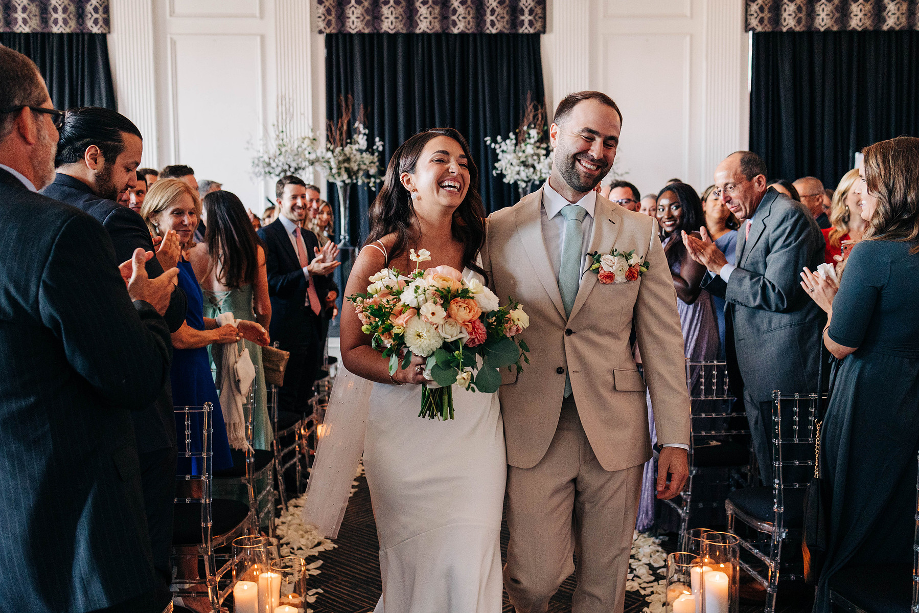 bride and groom walking down the aisle after getting married at the downtown club by cescaphe 