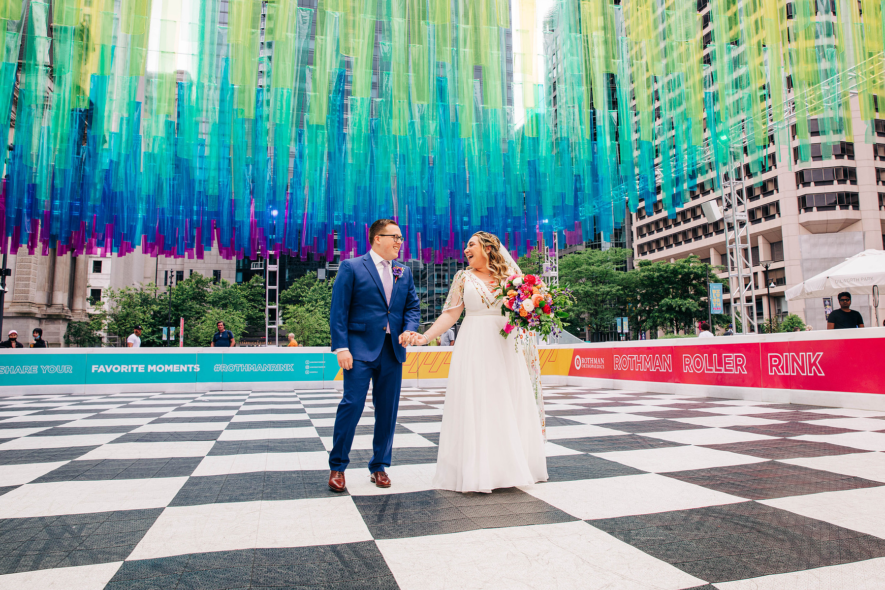 city hall philadelphia wedding photos at the roller rink