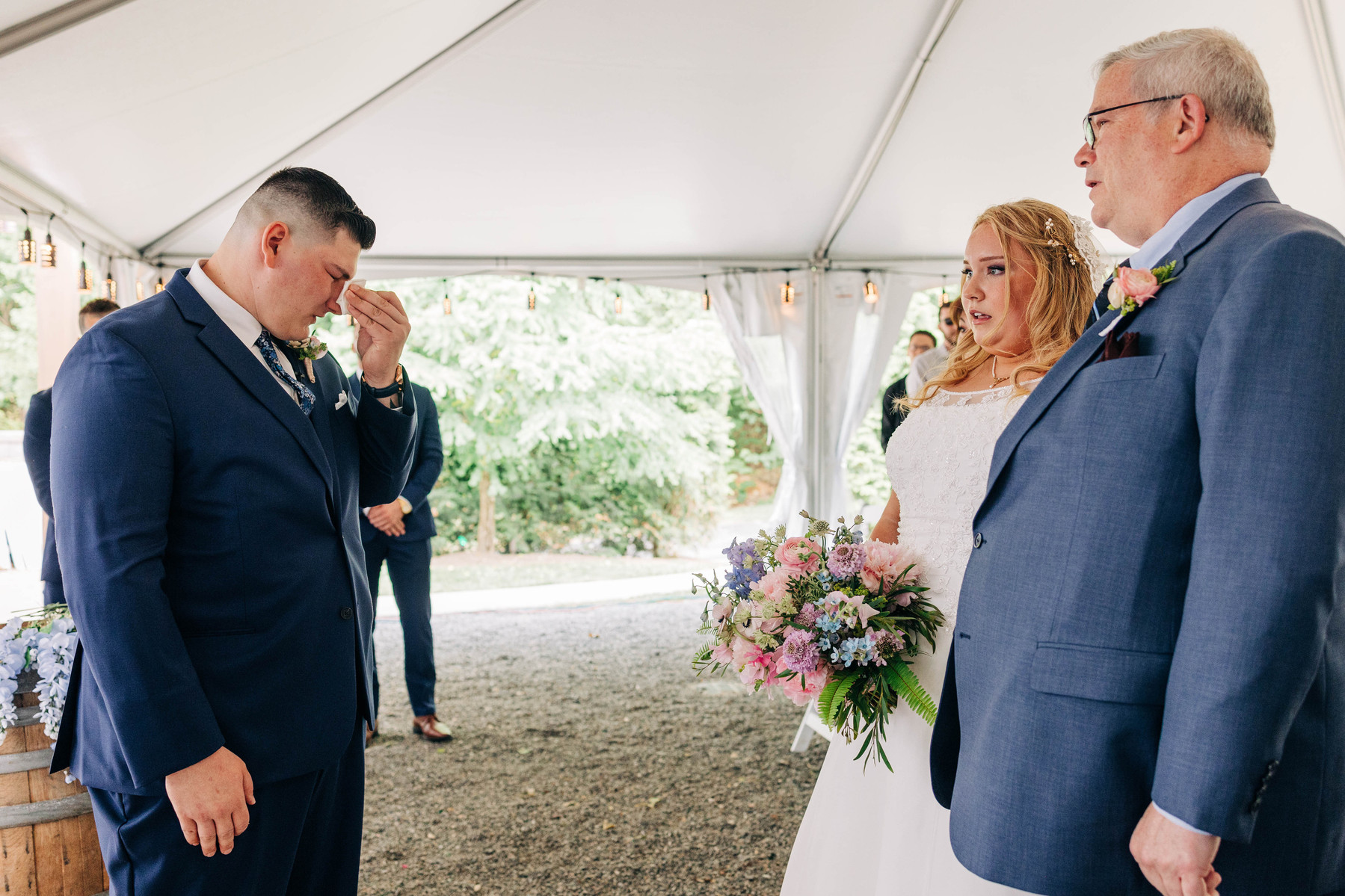 emotional moment of bride and groom at the aisle during their wedding ceremony
