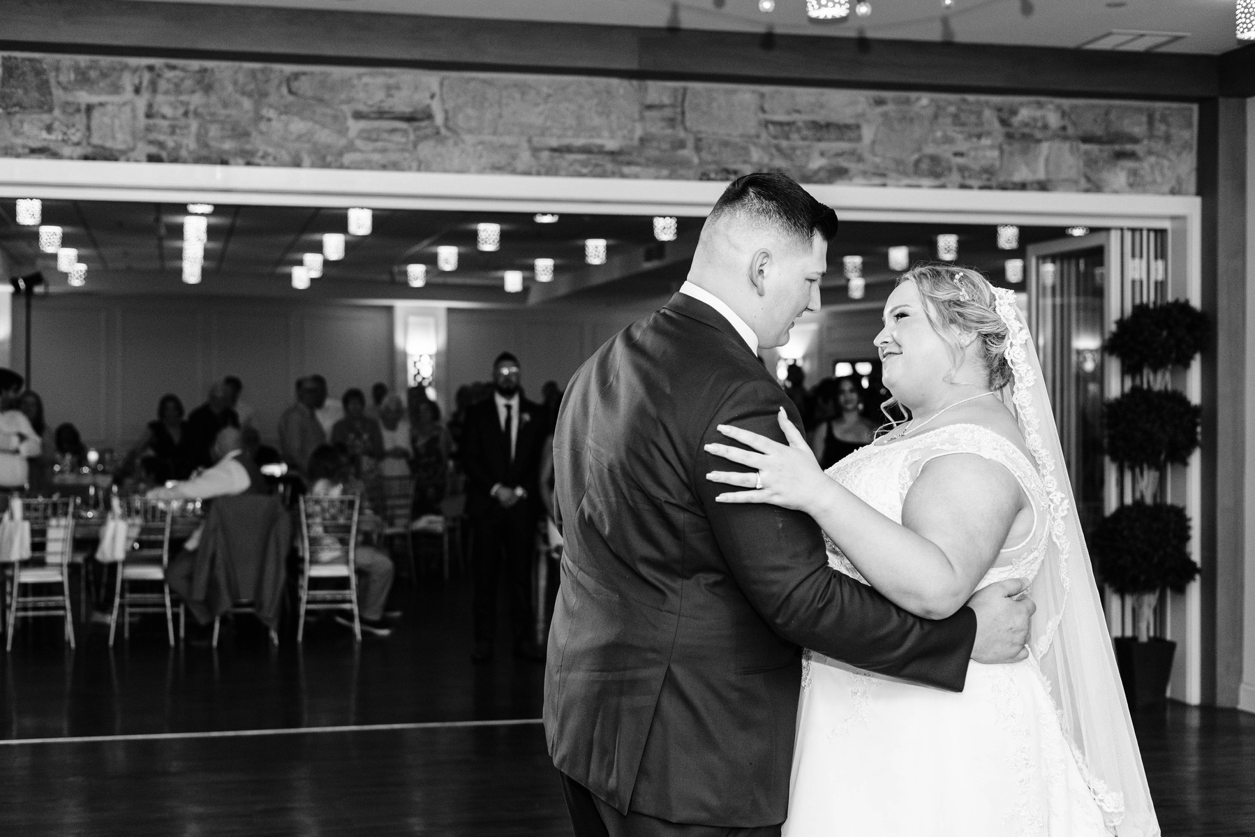 black and white photo of wedding day first dance 