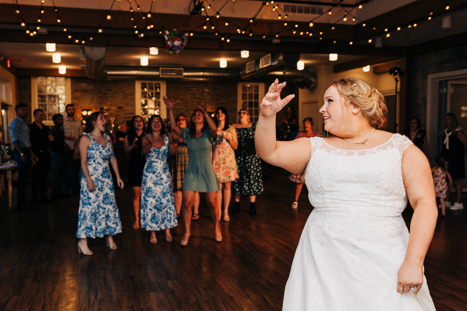 wedding reception bouquet toss