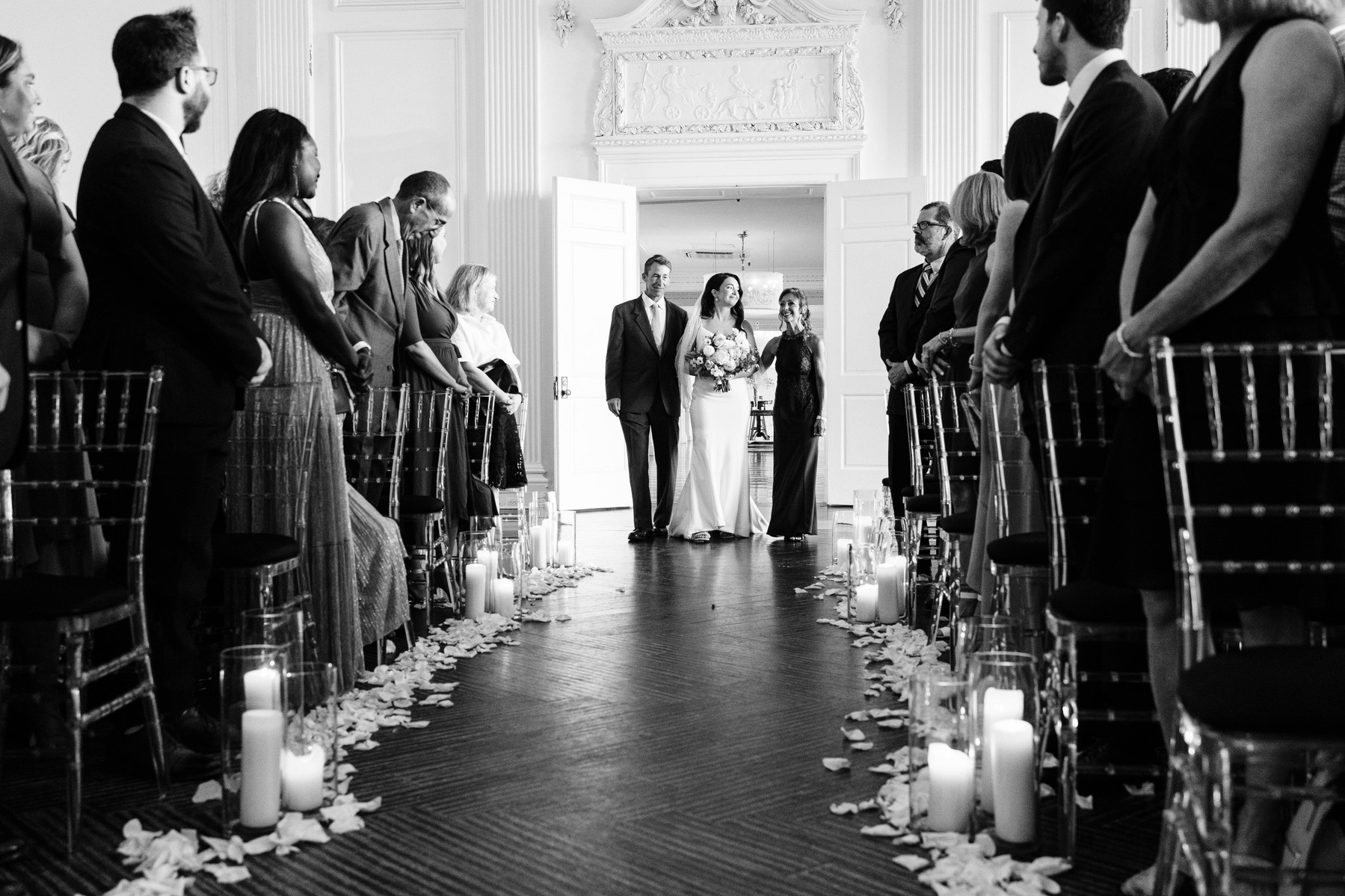 bride walking down the aisle with her parents at the downtown club philadelphia