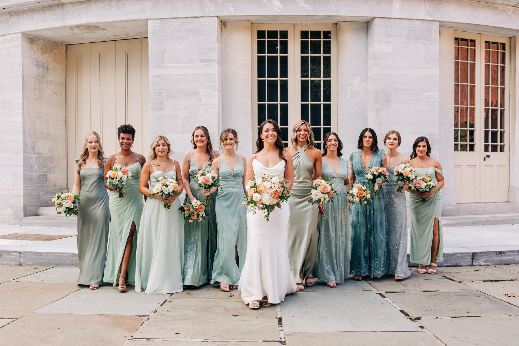 bride and bridesmaids group photography at merchant's exchange building in philly
