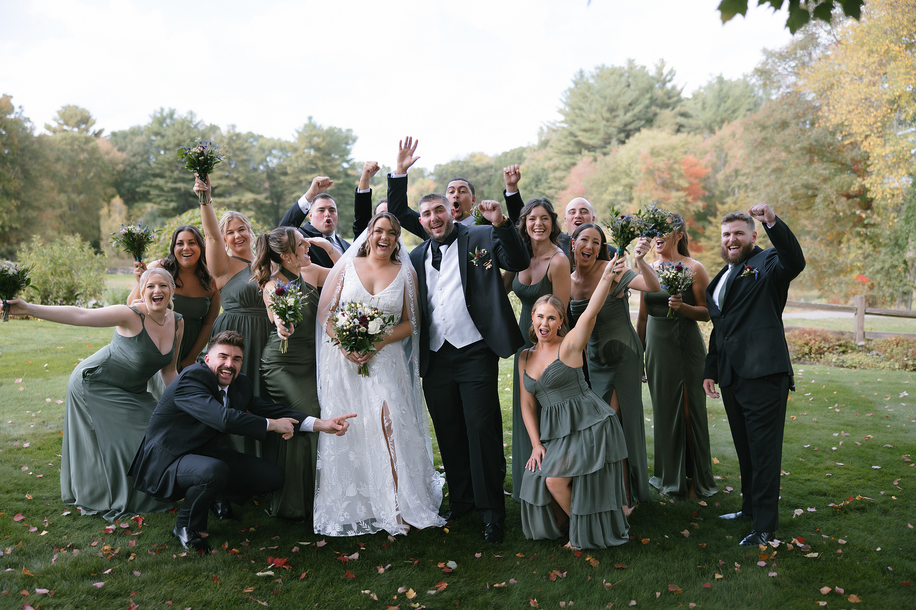Wedding party posing for a photo together. 