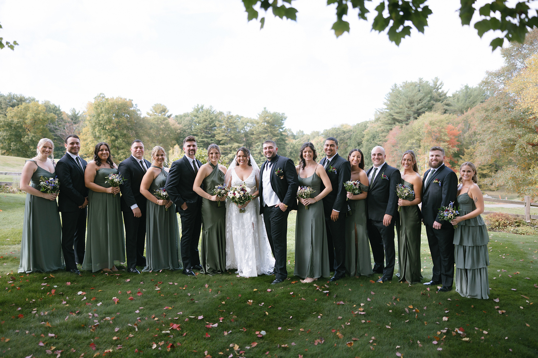 Wedding party posing for a photo together. 