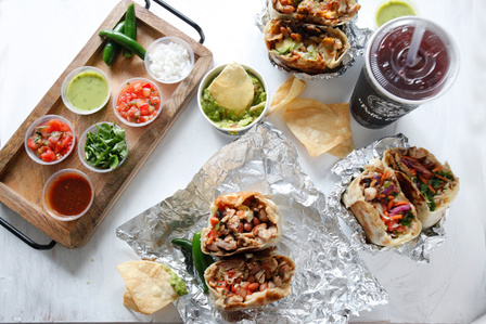 Burritos with a tray of salsas and chips being enjoyed at table
©Leslie Rodriguez Photography
Product and Lifestyle Photography
Boise, Idaho