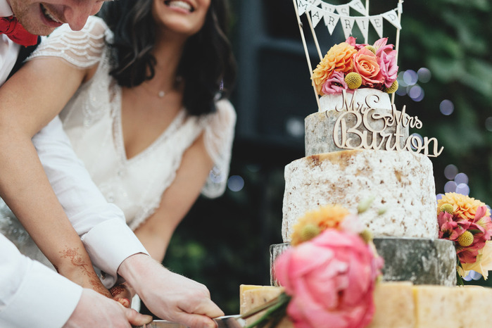 Northbrook Park Surrey Wedding Photography Cheese cake cut