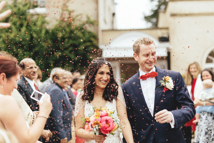 Northbrook Park Surrey Wedding Photography Couple Confetti Throw