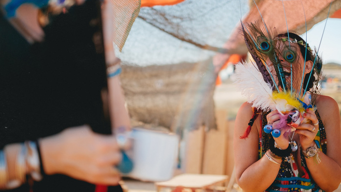 Preparations feather head dress festival wedding photography