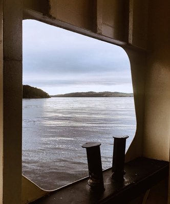 Taking the ferry across to Bruny Island by Travel photographer Nic Gossage