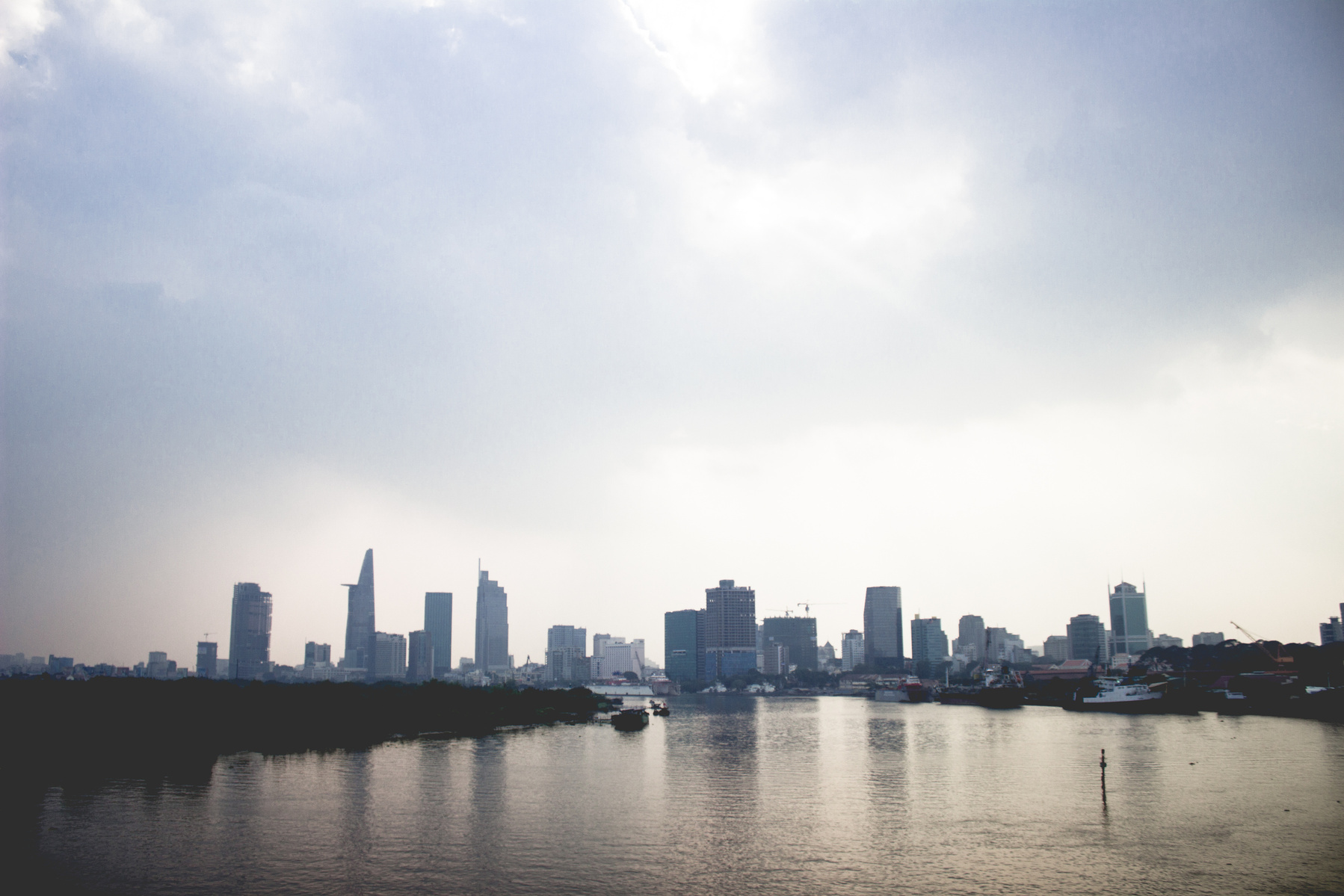 Skyline view with sky behind and vibrant lake in front