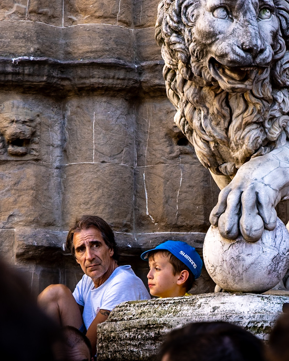 A boy and his father watching the Grand Depart of the Tour de France - Florence.