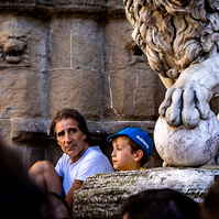 A boy and his father watching the Grand Depart of the Tour de France - Florence.