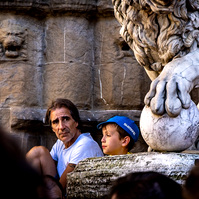 A boy and his father watching the Grand Depart of the Tour de France - Florence.
