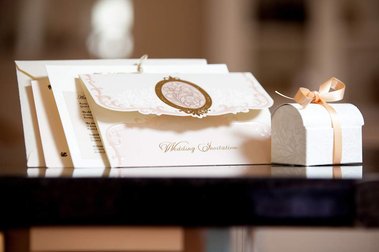 Natural candid wedding photography.  Wedding details.  Wedding invitations.  Wedding ring box.  