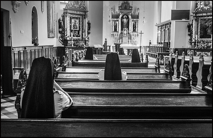 Nuns in Catholic church in Krakow