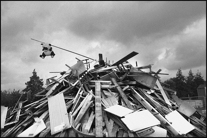 wood and a toy on a bonfire
