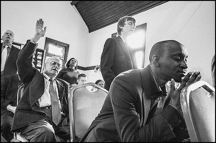 people praying in Belfast church