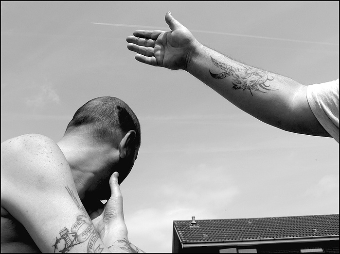 Republicans with tattoos in Falls South Belfast